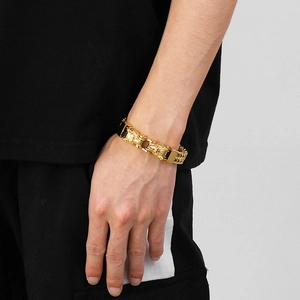 Bracelet pour homme avec double chaîne industrielle et têtes de lion en or brillant