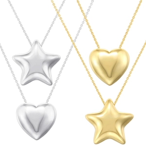 Detail view of 3D puffy heart and star pendants in gold and silver finishes on O-chains