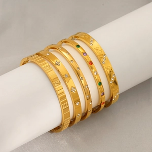 Five-piece gold titanium steel cuban link bracelet set with crystals and clover engraving