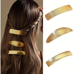 Three-piece gold matte alloy minimalist hair clip set shown on model and flat lay