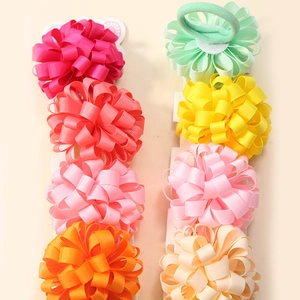 Colorful handmade grosgrain ribbon hair ties for kids in various vibrant solid colors
