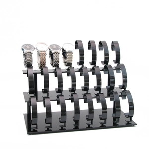 Three-tier black acrylic watch display stand with flexible C-ring holders for 24 watches