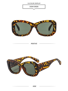 Detail view showing tortoise frame and green lenses of vintage Y2K square sunglasses
