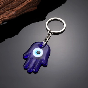 Bohemian Hamsa Hand keychain with blue glass Evil Eye pendant and silver keyring
