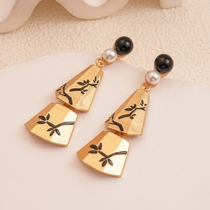 Vintage gold geometric earrings with pearl accents and black branch motifs for women