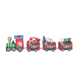 Detail of wooden Christmas train with festive figurines like snowman and gingerbread man