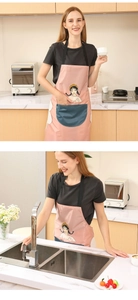Pink waterproof apron with blue front pocket and side hand towels featuring cartoon girl
