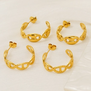 Double-layered wide gold stainless steel hoop earrings with star and moon charms
