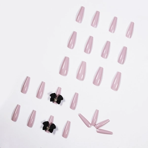 Long coffin lavender purple press-on nails with elegant black 3D bow and metallic accents