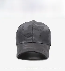 Detail of dark camouflage baseball cap with black 3D Classic embroidery on twill fabric