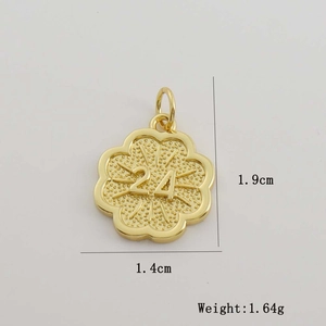 Detailed view of 18K gold plated flower pendant with dimensions 1.9cm and weight 1.64g
