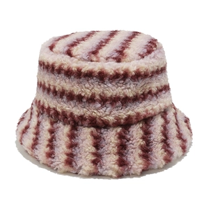 Close-up of fluffy faux fur texture on striped burgundy and beige bucket hat