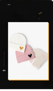 Detailed embroidery on winter knitted beanies featuring delicate heart pattern design