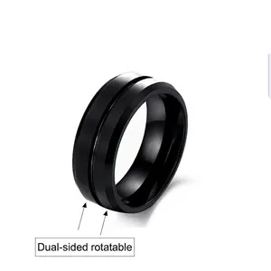 Close-up of matte black titanium spinner ring with double-sided rotatable design