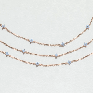 Insignia blue flower necklace in rose gold finish with micro-set zircon stones