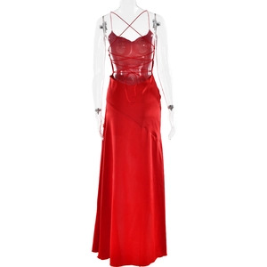 Detail of red silk evening dress showing sexy backless lace-up ties and high-slit texture