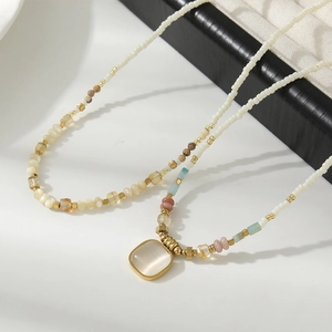 Handmade colorful natural stone beaded necklace with a gold vintage pendant for women