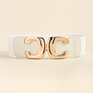 Detail of white elastic waist belt featuring a polished gold double C geometric metal buckle