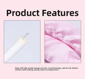 Detail of pink heatless curling rod showing internal sponge and flexible wire core
