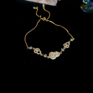 Elegant 18k gold plated gourd bracelet with white pearls and sparkling cubic zirconia stones