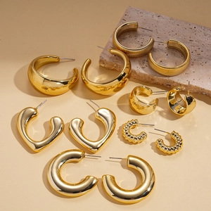 Set of six pairs gold hoop earrings including chunky C-shape and heart designs