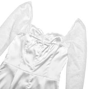 Detail of elegant white dress showing satin back, lace sleeves, and hidden zipper