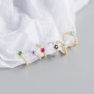 Set of six colorful gemstone huggie hoop earrings with delicate beaded metal texture