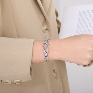 Detail of silver stainless steel square link chain necklace with double lobster clasps