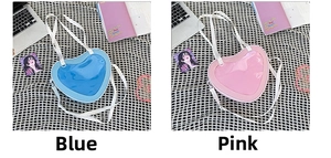 Detail of pink and blue heart-shaped ita bags with clear PVC windows and straps