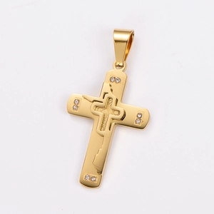 Detailed view of a gold-plated stainless steel cross pendant with relief patterns and gems