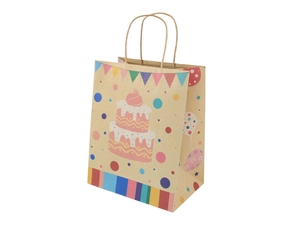 Close-up of brown kraft paper gift bag with colorful birthday cake and balloon print