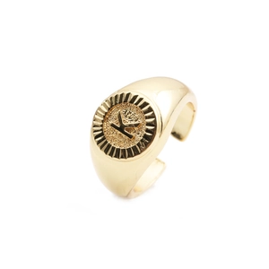 Detail of gold plated adjustable open ring featuring a polished letter K charm centerpiece