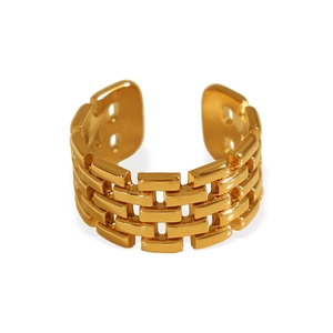 Golden titanium steel open ring with intricate woven mesh texture on white background