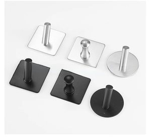 Detail of 304 stainless steel adhesive hooks in silver and matte black for bathroom