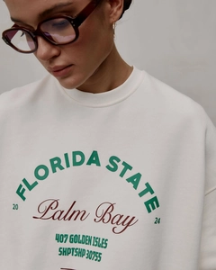 Close-up of retro Florida State letter print on white cotton crewneck sweatshirt