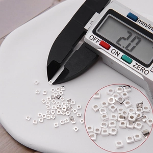 Digital caliper measuring 2.0mm S925 sterling silver square beads for DIY jewelry making