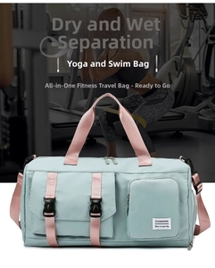 Detail view of mint green gym bag with pink straps and waterproof shoe compartment