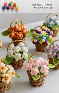 Macro shot of colorful hand-crocheted mini flower baskets featuring vibrant puff petals