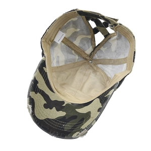 Detail view of 100% cotton camouflage ponytail baseball cap with vintage frayed brim