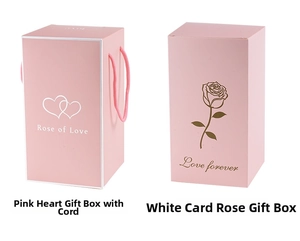 Detailed view of pink gift boxes featuring white hearts and golden rose patterns