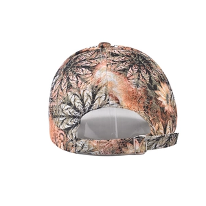Detail of adjustable silver metal buckle on floral embroidered baseball cap
