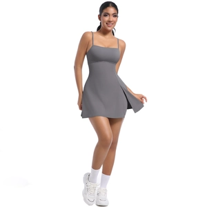 Close-up of a grey athletic dress with side slit and breathable stretch knit fabric
