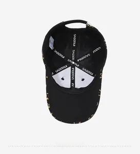 Detail view of the baseball cap's inner structure with SADDRUI branded tape and wash label
