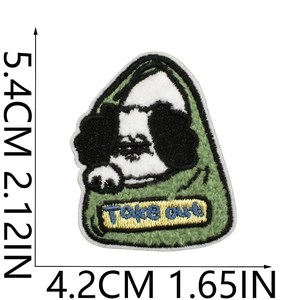 Detailed size view of embroidered dog patch in green bag showing height and width info