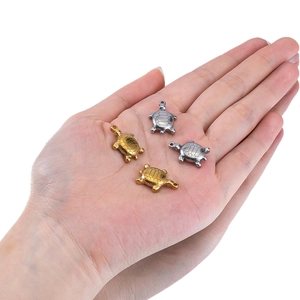Four gold and silver stainless steel sea turtle charms for DIY necklace and jewelry making