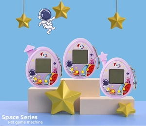 Macro shot of purple space-themed virtual pet toy with astronaut icons and key ring