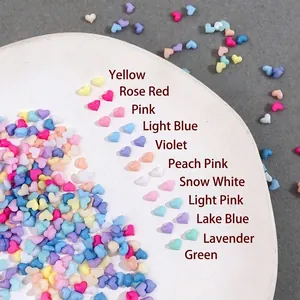 Colorful resin heart nail art charms in vibrant macaron candy colors for manicure design