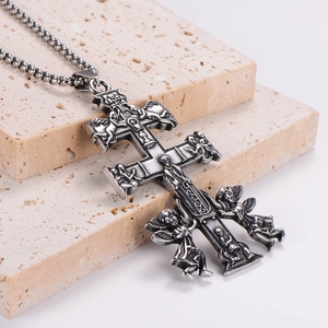 Intricate stainless steel angel cross pendant with embossed textures on stone