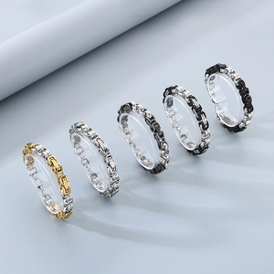 Byzantine chain bracelets for men in five metallic colors on a grey background