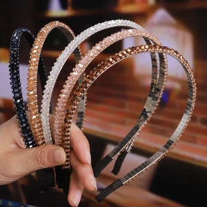 Detail of colorful crystal beaded headbands with hand-woven rhinestones and non-slip tips